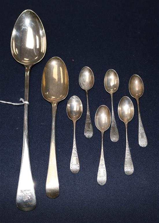 A George III silver basting spoon, London 1815, a silver serving spoon (marks rubbed) and a set of 6 teaspoons.